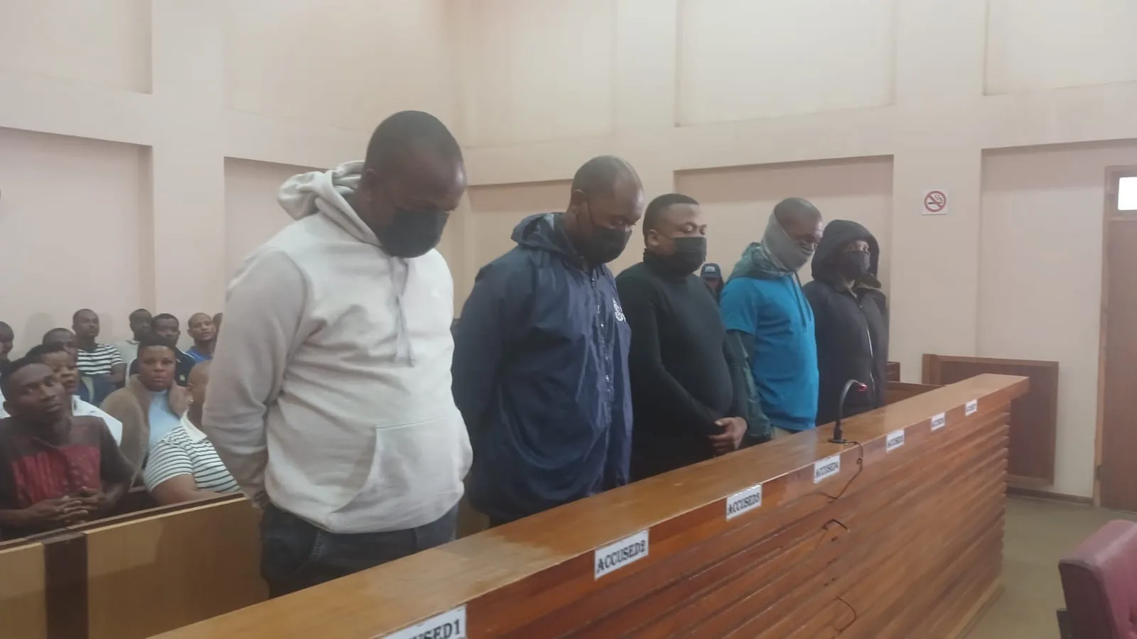 Alleged Robbers Remain in Custody